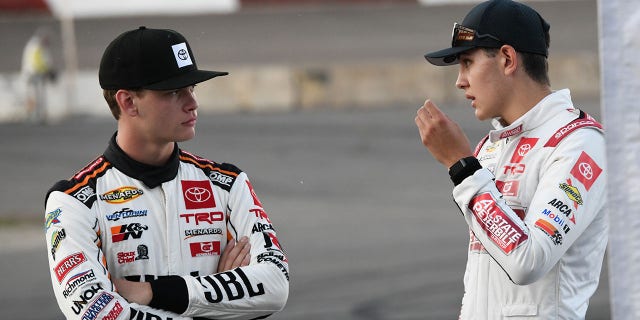 Jesse Love, JBL Toyota, talks to Sammy Smith, Kyle Busch Motorsports, during driver introductions on June 25, 2022, at Elko Speedway in Minnesota.