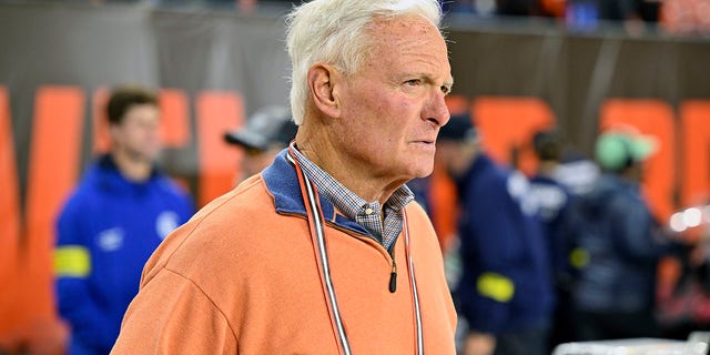 Cleveland Browns owner Jimmy Haslam walks on the field before an NFL game against the Pittsburgh Steelers in Cleveland, Ohio, on Sept.  22, 2022.