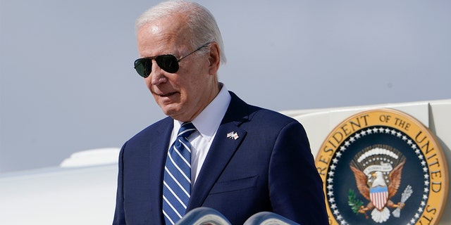 President Biden exits Air Force One as he arrives at Hancock Field Air National Guard Base in Mattydale, New York, Thursday, Oct. 27, 2022.