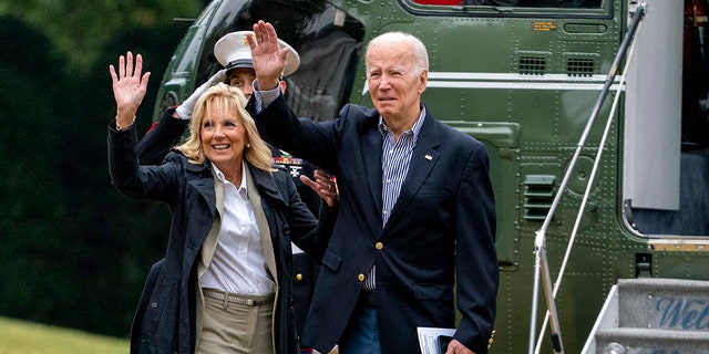 President Biden and first lady Jill Biden wave to a group of Latina women visitors on the lower balcony of the South Portico before boarding Marine One on the South Lawn of the White House Washington, Wednesday, Oct. 5, 2022.