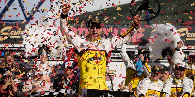 Joey Logano celebrates after winning the South Point 400 on Oct. 16, 2022, in Las Vegas.