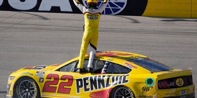 Joey Logano celebrates after winning the South Point 400 on Oct. 16, 2022, in Las Vegas.