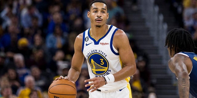 Golden State's Jordan Poole looks to pass against the Denver Nuggets at Chase Center in San Francisco on Oct. 14, 2022.