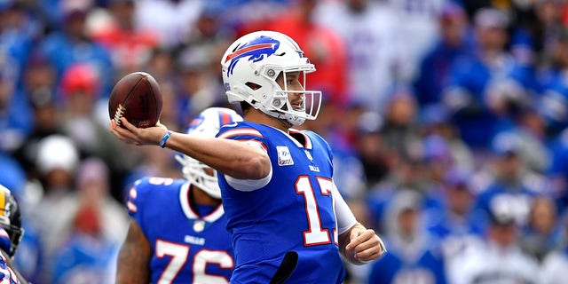 Buffalo Bills quarterback Josh Allen throws a touchdown pass to wide receiver Gabriel Davis during the Pittsburgh Steelers game in Orchard Park, New York, Sunday, Oct. 9, 2022.