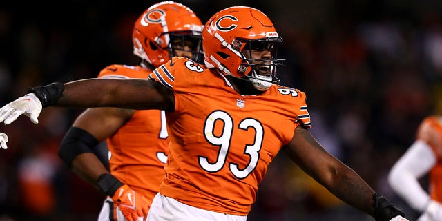 Justin Jones of the Bears celebrates after a missed field goal during the Washington Commanders game at Soldier Field on Oct. 13, 2022, in Chicago.