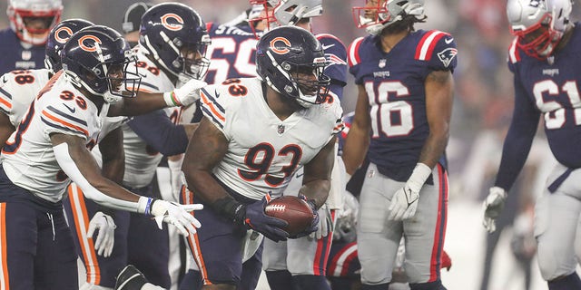 Chicago Bears defensive tackle Justin Jones recovers a fumble against the New England Patriots at Gillette Stadium in Foxborough, Massachusetts, on Oct. 24, 2022.