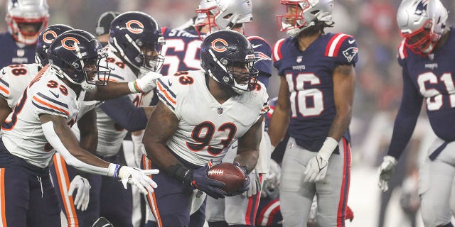 Chicago Bears defensive tackle Justin Jones recovers a fumble against the New England Patriots at Gillette Stadium in Foxborough, Massachusetts, on Oct. 24, 2022.