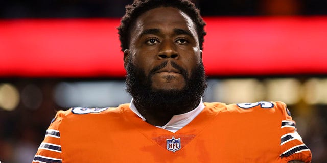 Justin Jones of the Bears stands during the national anthem before the Washington Commanders game at Soldier Field on Oct. 13, 2022 in Chicago.