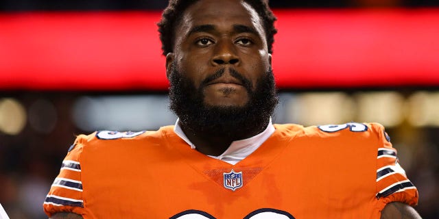 Justin Jones of the Bears stands during the national anthem before the Washington Commanders game at Soldier Field on Oct. 13, 2022 in Chicago.
