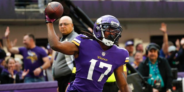 Minnesota Vikings wide receiver K.J. Osborn celebrates after catching a touchdown pass against the Arizona Cardinals, Oct. 30, 2022, in Minneapolis.