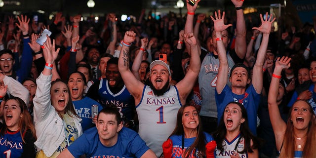 University of Kansas students react to watching the NCAA men's basketball national championship game April 4, 2022. 