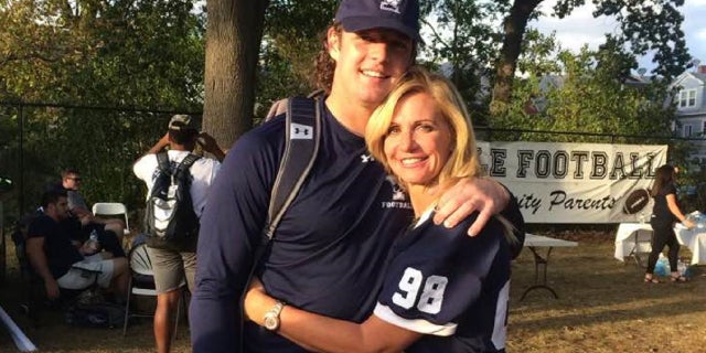 Regina and Kyle Mullen smiling for camera