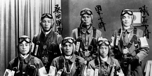 Determination and pride show in the faces of these young Japanese pilots trained as kamikaze flyers. The suicide pilots crashed planes loaded down with explosives, extra fuel and special missiles into enemy ships. Kamikaze, "Divine Wind," refers to a typhoon that swept Mongol invaders away from the Japanese coast in the 13th century. 