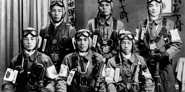 Determination and pride show in the faces of these young Japanese pilots trained as kamikaze flyers. The suicide pilots crashed planes loaded down with explosives, extra fuel and special missiles into enemy ships. Kamikaze, "Divine Wind," refers to a typhoon that swept Mongol invaders away from the Japanese coast in the 13th century.