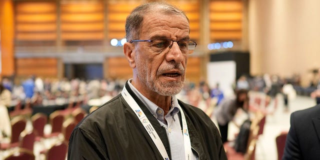 Mahmoud Khosravi Vafa, president of Iran's national Olympic committee, takes a reporter's question during an interview in Seoul, South Korea, Thursday, Oct. 20, 2022. 