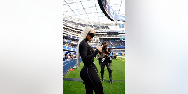 Kim Kardashian attends the game between the Dallas Cowboys and the Los Angeles Rams at SoFi Stadium on Oct. 9 in Inglewood, California.