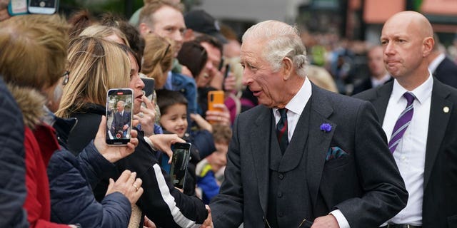King Charles III greets members of the public after an official council meeting at the City Chambers in Dunfermline, Fife, to formally mark the conferral of city status on the former town on Oct. 3, 2022, in Dunfermline, Scotland.