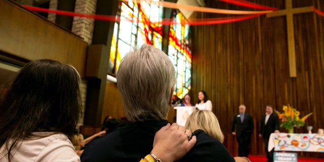 Community members celebrate the Supreme Court decision on marriage equality at an event hosted by Texas for Marriage at the Central Presbyterian Church in downtown Austin, Texas, on June 26, 2015.