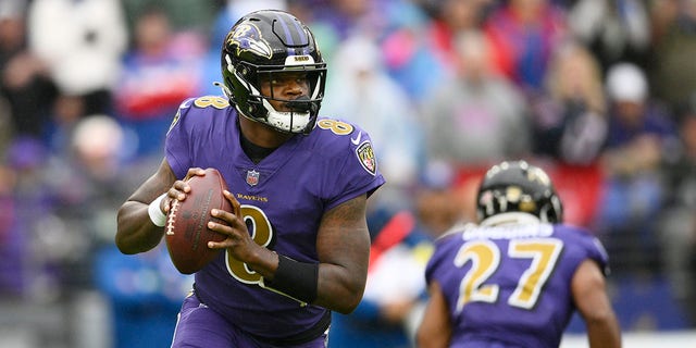 Baltimore Ravens quarterback Lamar Jackson looks for a receiver in the first half of an NFL football game against the Buffalo Bills on Sunday, Oct. 2, 2022, in Baltimore. 