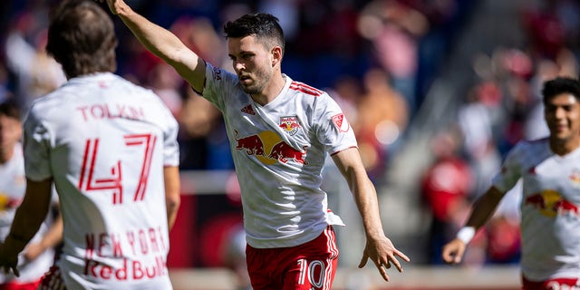 Lewis Morgan #10 of New York Red Bulls celebrates his goal in the second half of the Eastern Conference Round One match in the Audi 2022 MLS Cup Playoff against FC Cincinnati at Red Bull Arena on October 15, 2022, in Harrison, New Jersey.