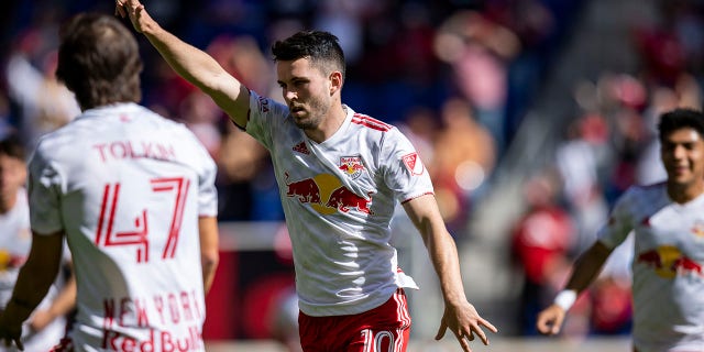 Lewis Morgan #10 of New York Red Bulls celebrates his goal in the second half of the Eastern Conference Round One match in the Audi 2022 MLS Cup Playoff against FC Cincinnati at Red Bull Arena on October 15, 2022, in Harrison, New Jersey.