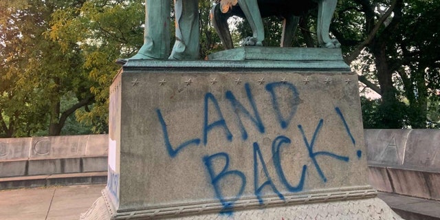 Vandals also spray-painted graffiti on the base that said, "Dethrone the Colonizers," "Land Back!" and "Avenge the Dakota 38."