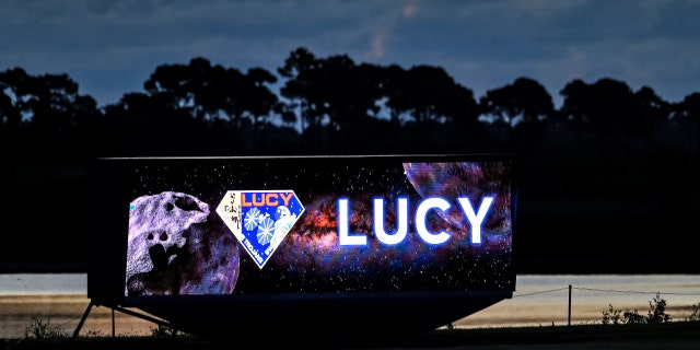 The launch clock, showing a digital display for NASA's Lucy spacecraft for a mission to study the Trojan asteroids in the outer solar system, as the Kennedy Space Center press site prepares for launch from the Cape Canaveral Space Force Station in Cape Canaveral, Florida, U.S. October 15, 2021.
