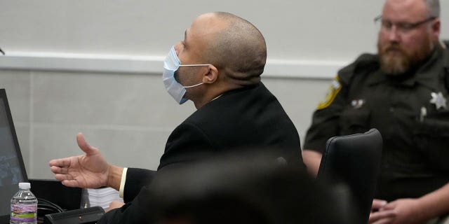 Darrell Brooks argues with County Circuit Court Judge Jennifer Dorow as jurors are brought in during his appearance in a Waukesha County Circuit Court during jury selection in Waukesha, Monday, Oct. 3, 2022. Brooks, who is representing himself in the trial, is charged with drive into the Waukesha Christmas Parade last year to kill six people and injure dozens more. He faces six counts of first-degree intentional homicide and 71 other counts.