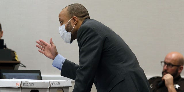 Darrell Brooks, who faces homicide and other charges in the 2021 Christmas parade tragedy, cross-examines a witness on Oct. 14, 2022, during his trial in Waukesha, Wisconsin.