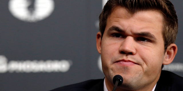 World chess champion Magnus Carlsen attends a news conference ahead of the 2016 World Chess Championship in New York City Nov. 10, 2016.