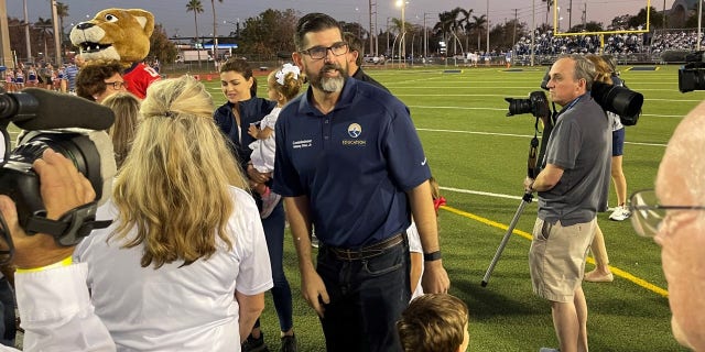 Florida Commissioner of Education, Manny Diaz Jr. attends a high school football game