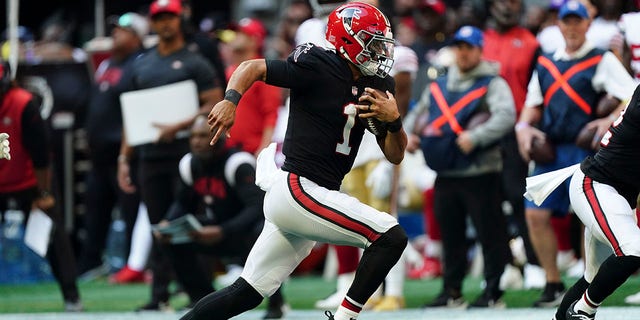 Atlanta Falcons quarterback Marcus Mariota (1) runs against the San Francisco 49ers during the second half of a game Oct. 16, 2022, in Atlanta. 