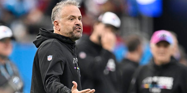 Carolina Panthers head coach Matt Rhule speaks to officials during the second quarter of a game against the San Francisco 49ers at Bank of America Stadium on October 9, 2022 in Charlotte, North Carolina.