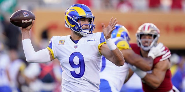 Los Angeles Rams quarterback Matthew Stafford (9) passes against the San Francisco 49ers during the first half of an NFL football game in Santa Clara, Calif., Monday, Oct. 3, 2022. . 