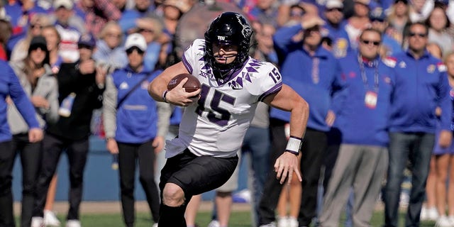 TCU quarterback Max Duggan (15) runs the ball during the first half against Kansas on Oct. 8, 2022, in Lawrence, Kansas.