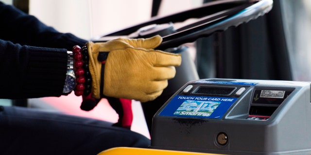 A Metrobus operator drives in Washington, DC, on Oct. 24, 2018. 