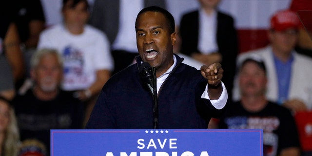 John James, Republican candidate for the 10th District, speaks during former President Trump's Save America rally at Macomb County Community College Sports and Expo Center in Warren, Mich., Oct. 1, 2022.