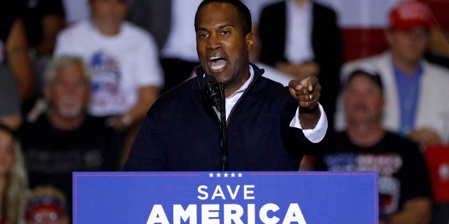Republican Michigan U.S. House Candidate John James speaks at a rally with former President Donald Trump