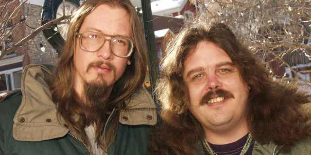 Mark Borchardt and Mike Schank, right, at the 2002 Sundance Film Festival in Park City, Utah. Schank has died of cancer at the age of 56.