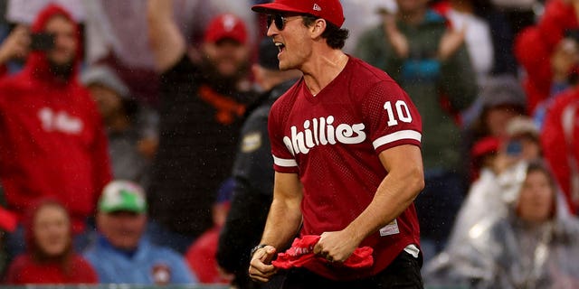 Actor Miles Teller cheers for the Philadelphia Phillies during Game 5 of the National League Championship Series against the San Diego Padres at Citizens Bank Park Oct. 23, 2022, in Philadelphia.