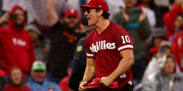 Actor Miles Teller cheers for the Philadelphia Phillies during Game 5 of the National League Championship Series against the San Diego Padres at Citizens Bank Park Oct. 23, 2022, in Philadelphia.