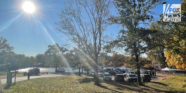 Princeton rescue personnel seen gathering near the Carnegie Lake and the Class of 1887 Boathouse on Princeton University campus. 