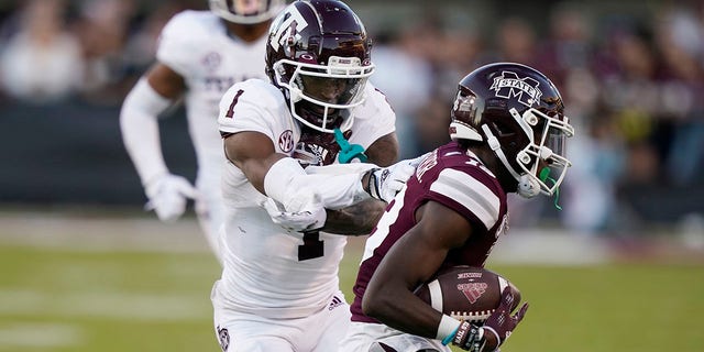 Mississippi State cornerback Emmanuel Forbes reaches out to intercept during the second half of an NCAA college football game against Mississippi State University in Starkville, Mississippi, October 1, 2022, Texas. A&M wide receiver Evan Stewart loses the pass. Mississippi. Won 42-24.