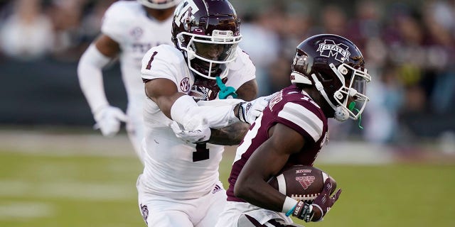 Mississippi State cornerback Emmanuel Forbes reaches out to intercept during the second half of an NCAA college football game against Mississippi State University in Starkville, Mississippi, October 1, 2022, Texas. A&M wide receiver Evan Stewart loses the pass. Mississippi. Won 42-24.