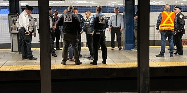 the Northbound F train platform at the Jackson Heights-Roosevelt Ave station.