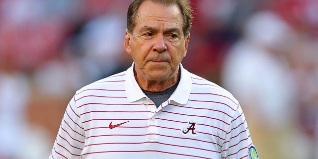 Nick Saban looks out over the field