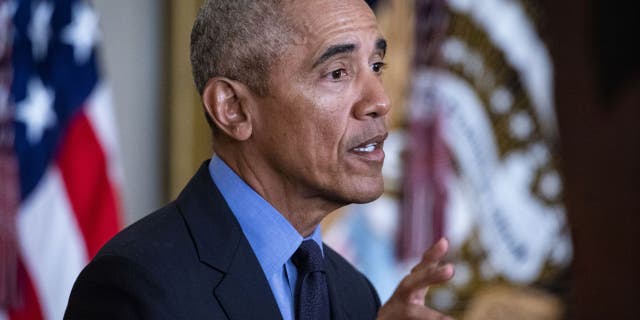 Former President Obama speaks about the Affordable Care Act and lowering health care costs in the East Room of the White House on April 5, 2022.