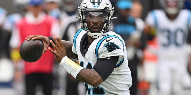 Carolina Panthers quarterback PJ Walker (11) throws against the Los Angeles Rams during the first half of an NFL football game Sunday, Oct. 16, 2022, in Inglewood, Calif.