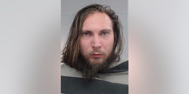 Michael and Kay Scarlett's son has been arrested in connection with their deaths.