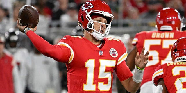 Kansas City Chiefs quarterback Patrick Mahomes (15) throws a pass during the first half against the Tampa Bay Buccaneers on Oct. 2, 2022, in Tampa, Florida.